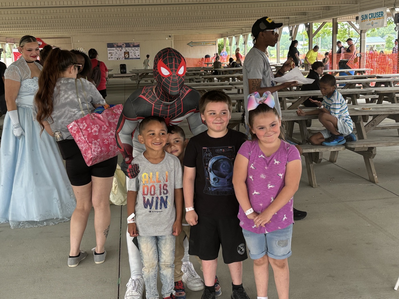 Kids at Family Fun Day with costumed characters